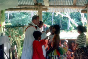 Fr. Horgan distributing communion in Yap.